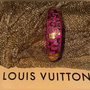 Brand New *Louis Vuitton
Monogrammed Resin LV, Gold flaked bangle